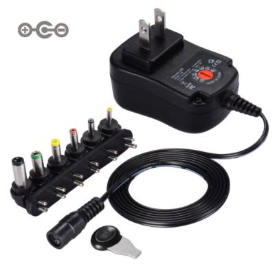 China CCTV 12W Universal Multi Voltage AC/DC Adapter Switching Power Supply With 6 Tips Suitable For 3V To 12V Device for sale