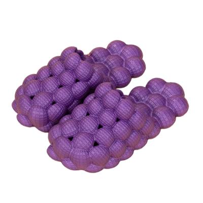 China Fashion Trend Personalized Fashion Couple Indoor And Outdoor Creative Massage Slippers For Women And Men for sale