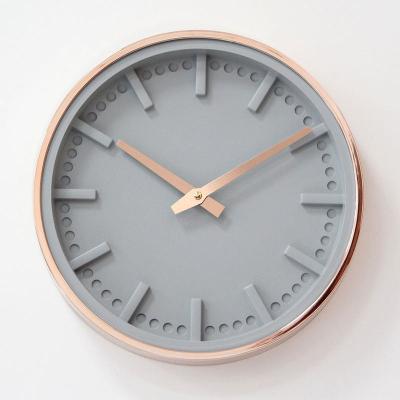 China 10 inch plastic wall clock price date quartz decoration round simple home cheap automatic design wall clock with gift custom clock for sale