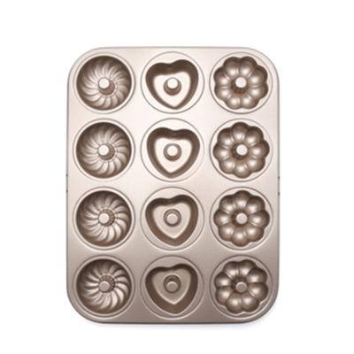 China Reuseful Sustainable Carbon Steel Liner Bakeware Heat Resistant Donut Pan Cupcake Mold for sale