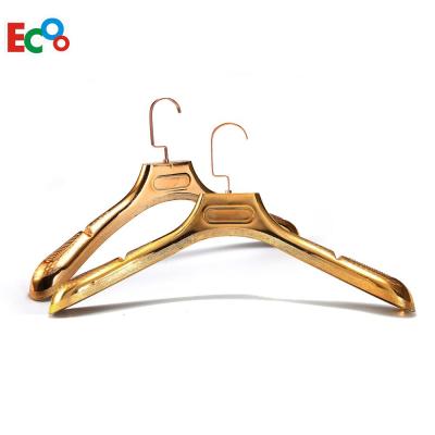 China Eco-friendly hot sale gold plastic fancy bulk hanger with wholesale price for sale