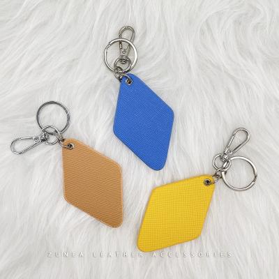 China Custom Logo Keychain Oval Vegan Leather Key Chain Diamond Shape PU Leather Key Chain For Ladies for sale