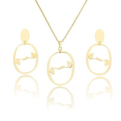 China TRENDY Wavy Oval Gold and Tangled Silver Hollow Out Fashion Jewelry Set for Gift Engagement for sale