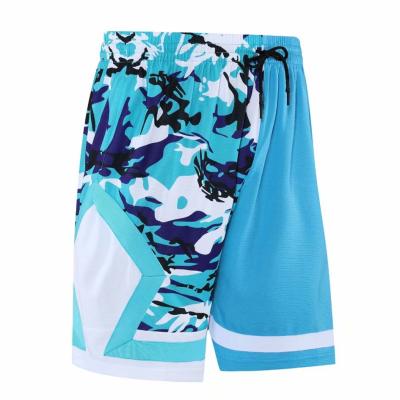 China Breathable Basketball Shorts Zipper Pockets Sports Shorts Sports Apparel Uniforms Customized Logo Number for sale