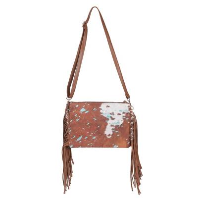 China Hot Sale PU Cow Print Faux Fur Shoulder Leather Cross - Body Messenger Bag With Tassels for sale