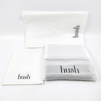 China Manufacturers Clothing Stores Custom Sticker Bags Biodegradable With Tape T-shirts Sweater Paper Bags for sale