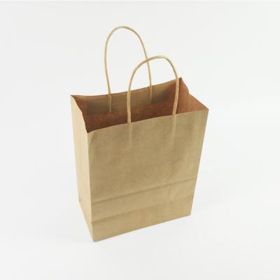 China Twisted biodegradable custom print handles brown paper bags for clothes clothes packaging paper bag flexo printing handled paper bag for sale