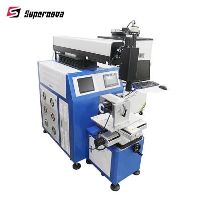 China Equipo de soldadura rotatorio automático de laser de la abrazadera de la soldadora de laser del acceso directo de memoria en venta