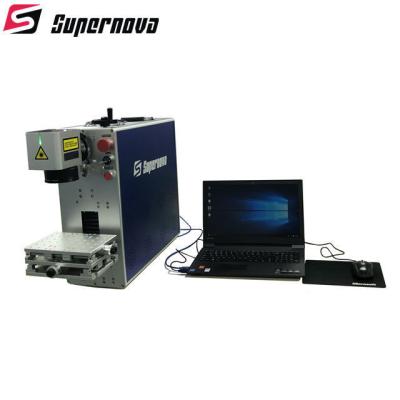 China Gravura a água-forte de alta velocidade do laser do cobre da máquina da marcação do laser do Portable que grava os SS materiais à venda