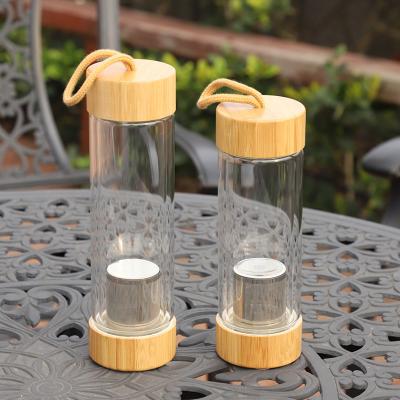 China 2019 New Design Sustainable Custom Bamboo Lid Double Wall Glass Tea Infuser Water Bottle With Rope for sale