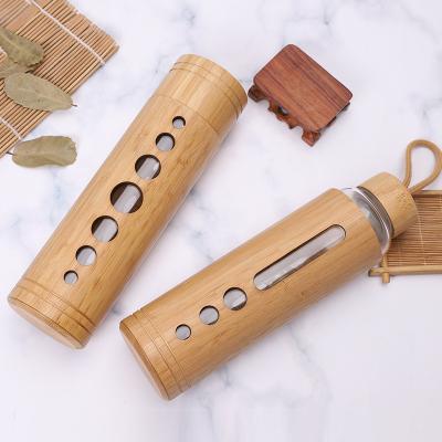 China Custom Viable Lid Bamboo Glass Water Bottle Natural Bamboo Glass Coffee Mug With Bamboo Sleeve for sale