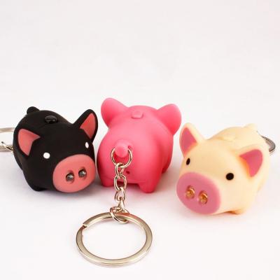 China Promotional gift and healthy light pink cute piggy piggy key chain flashlight pink, beige and black small piggy design led key chain flashlight for sale