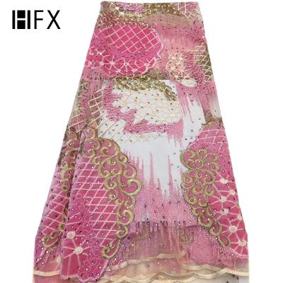 China 2019 Sustainable High Quality African Lace Polyester Fabric Net Tulle Lace With Stone for sale