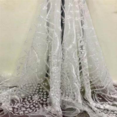 China 2019 Viable New Fashion 3D Flower Wedding Dress Lace Fabric Nigerian White Color French Net Lace Fabrics for sale