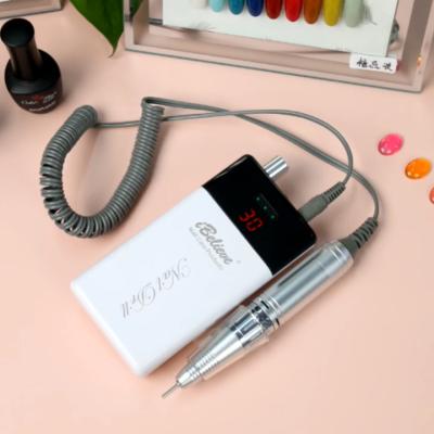 China Hot Selling Plastic Nail Folder Professional Portable Rechargeable Electric Nail Drill Machine For Nail Polish for sale