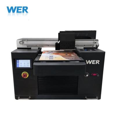 China Garment Shops 2021 WER-E3055UV LED Portable Size A3 UV Flatbed Printer For Phone Case Printing for sale