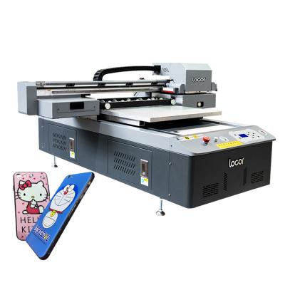 China Hotel Manufacturer Affordable Price 600*900mm 3D Printers 3pcs xp600 Digital UV Flatbed White Ink Printing Machine for sale