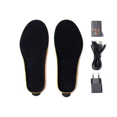 China Remote filling electric heating insole made up of new design fiber or pet radio heated insoles for shoes men for sale