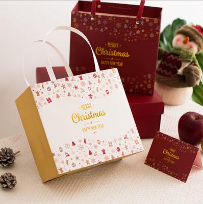 China Eco - Friendly Recycled Materials Christmas Kraft Paper Biodegradable Gift Bag With Your Own Logo for sale