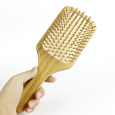 China Hotel Wholesale Eco-freindly Conduit Paddle Detangling Cushion Massage Natural Bamboo Hair Brush Large for sale