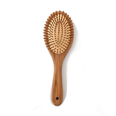 China Porfessional Waterproof Comfortable Paddle Plant Air Cushion Massage Hair Comb Bamboo Oval Handle With Hole Wooden Hair Brush for sale