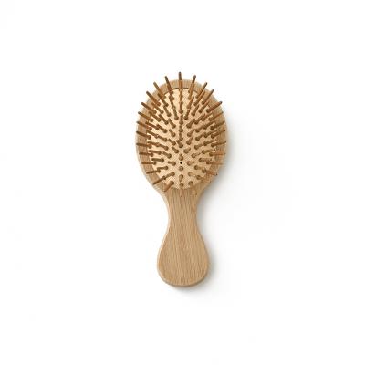 China Portable Home Makeup Bamboo Comb Travel Comb Massage Airbag Brush Solid Wood Comb for sale