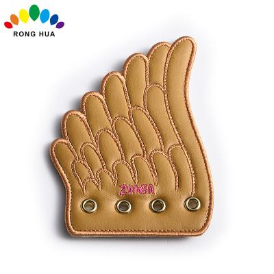 China 3D custom clothing or shoes embossed soft rubber patch for sale