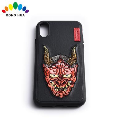 China Newest fashion embroidery design stylish silicone phone casec for sale