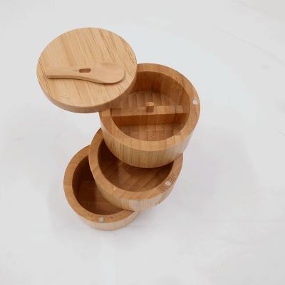 China Luxury New Design Smooth Non-Toxic Multi Functional Bamboo Dispenser Storage Box Wooden Rice Round Salt Spice Box Set for sale