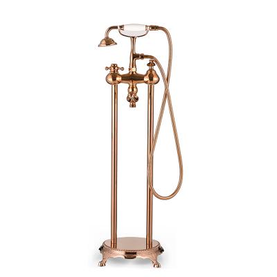 China Classic Luxury Antique Brass Bathroom Freestanding Bath Tub Shower Mixer Taps SM23061 Rose Gold Clawfoot Floor Stand for sale