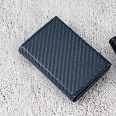 China RFID Blocking RFID Metal Credit Card Holder Fashion PU Carbon Leather Soft Magnetic Button Wallet Single Aluminum Box Card Wallet for sale