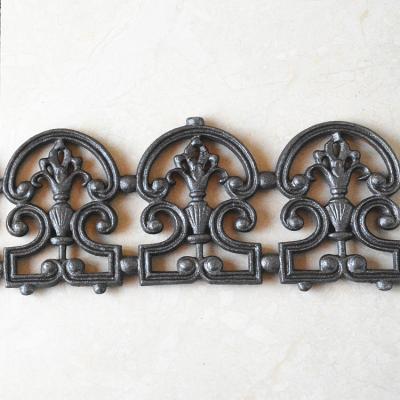 China Beautiful Cast Iron Main Gate Waterproof Design Wrought Iron Fence Accessories Cast Ornaments For Window Grill Stair Railing for sale