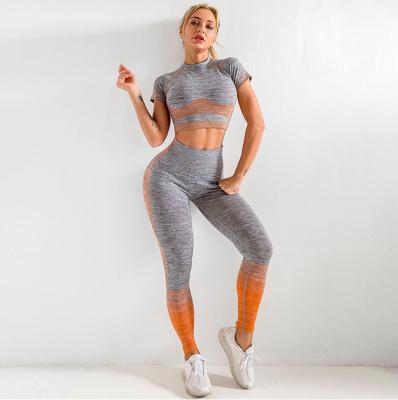 China Naked Seamless Short Pantsuit Running Navel Sleeve Yoga Stain Style Warm Breathable Gradual Motion Bodice Quick Dry Training for sale