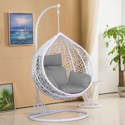 China Modern Hanging Chair With Round Frame Rattan Egg Garden Rattan Swing Hanging Chair for sale