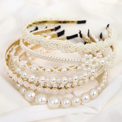 China Fashion wholesale luxury daily wear white pearl beaded headband pearl bow hair accessories handmade headband for girls headband for sale