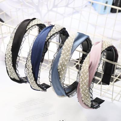 China Fashion New Korean Hair Hoop Fashion Solid Color Cloth Pearl Headband Plastic Toothed Women Hair Accessories Headband With Pearl for sale