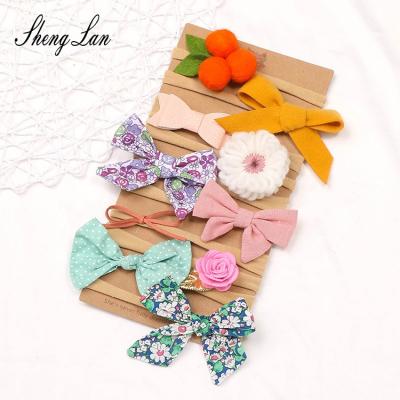 China Shenglan Fashionable 10 Pcs/Set Cute Baby Flower Headbands For Babies Kids Soft Headband Hair Hangers Soft Kids Hair Accessories for sale