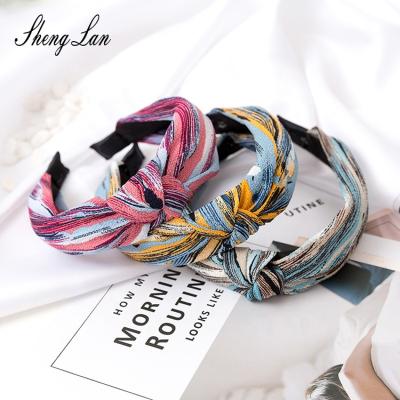 China Shenglan fabric friendly material bow hot selling headbands for girls hair accessories tie headband sports for women for sale