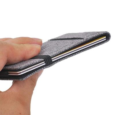 China Magic Wallet Fashion Men's Slim Front Pocket Wallet - Minimalist Elastic RFID Credit Card Holder Wallet for sale