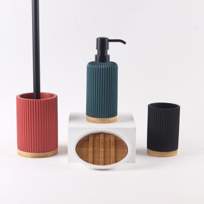 China New 2022 Sustainable Colorful Polyresin Bathroom Set With Bamboo Parts Bathroom Accessories Set for sale