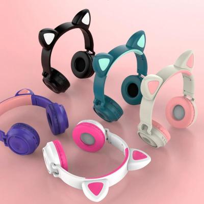 China Cute Adults Girls Kids LED Tooth 5.0 In-Ear Cat Ear Headphones Wireless Blue Headphones Glowing Support TF Card With MIC For Gift for sale