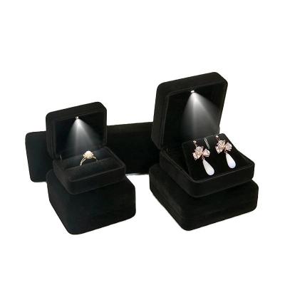 China Fashion Customized luxury black lacquer logo silk screen luxury led jewellery package custom ring boxes jewelry box with lights for sale