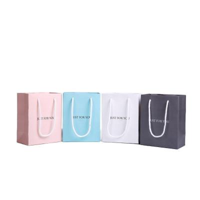 China Recyclable Top Luxury Ribbon Handle Boutique Shopping Packaging Customized Printed Tote Paper Gift Bags With Handle for sale