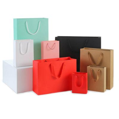 China Recyclable Top Gift Packaging Shopping Paper Bag With Own Design Wholesale Personalized Logo Luxury Fancy Paper OEM Clothes Pants for sale