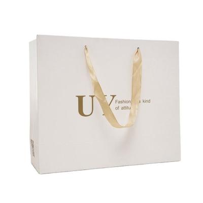 China Recyclable Top Luxury Ribbon Handle Boutique Shopping Packaging Customized Printed Euro Paper Gift Bags With Logo for sale