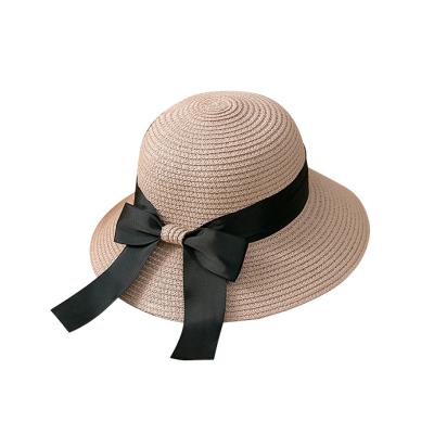 China Breathable Summer Sun Protection Beach Hat Fashion Ribbon Bow Ladies Foldable Straw Hat for sale