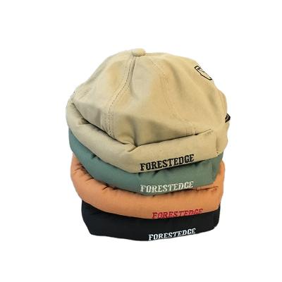 China JOINT Retro FORESTEDGE Embroidery Sailor Skull Hat Brimless Adjustable Hip Hop Hat for sale