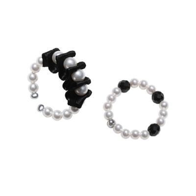 China Pearl Beaded Ring One Size Fits All People White Pearl Black Ribbon And Crystal Beaded Finger Ring for sale