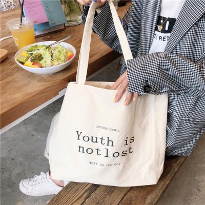 China Hosting OEM Korean Style Central Institute of Statistics Shopping Bag Solid Color Shoulder College Canvas Bags English Girls Retro for sale