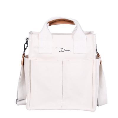 China Best Selling Fashion Large Capacity Canvas Shoulder Bag Solid Color Casual Messenger Bag for sale